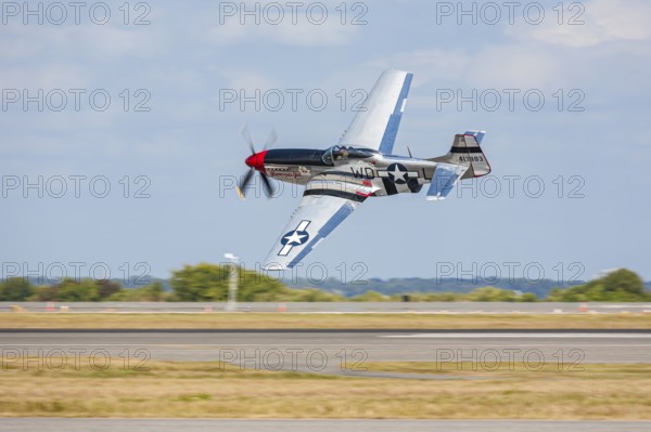 P-51 Mustang Glamorous Gal performing in air show at NAS Jacksonville, Florida, USA, North America