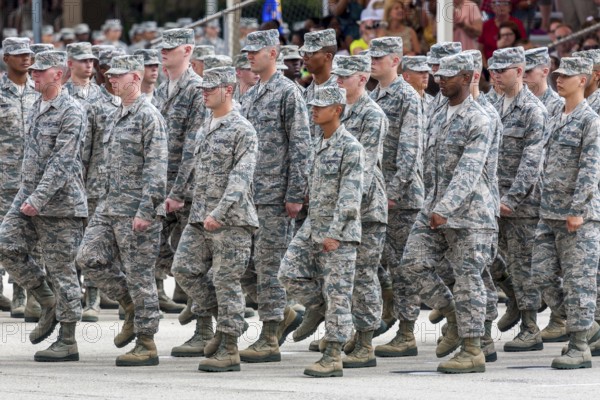 Flight of airmen marching in formation during United States Air Force basic training graduation