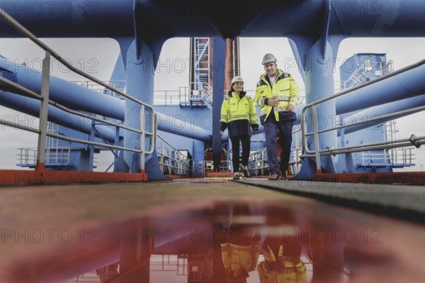 (R-L) Patrick Krawutschke, Managing Director of Container Terminal Altenwerder, and Annalena