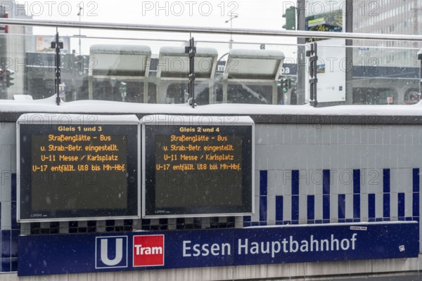 Essen main station, display board informs about cancelled local transport connections, partly full