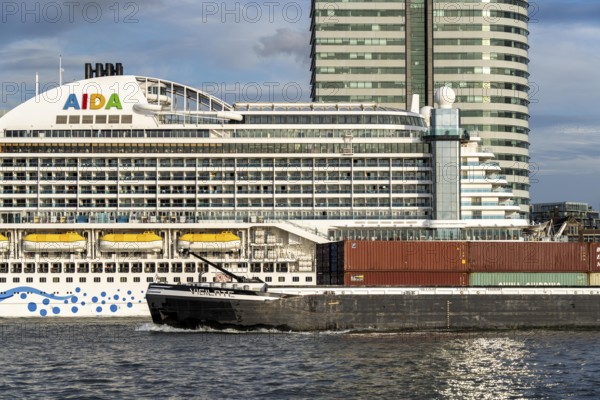 Cruise ship Aida Prima at the Cruise Terminal of Rotterdam, Kop van Zuid, high-rise buildings at