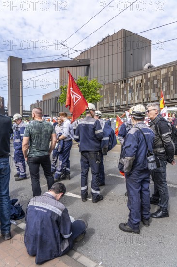 Steelworkers at a demonstration in front of the headquarters of ThyssenKrupp Steel Europe in