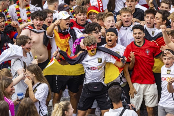 UEFA European Football Championship. Enthusiastic fans at the public viewing in the host city of