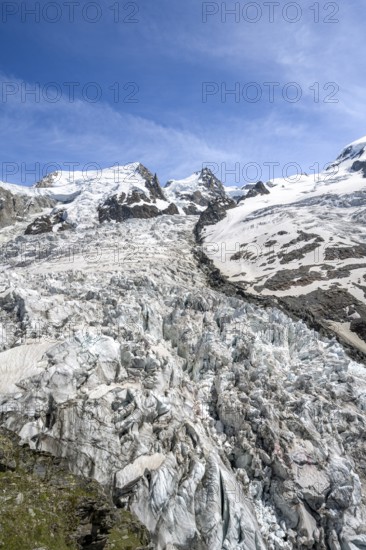 High alpine glaciated mountain landscape, La Jonction, Glacier des Bossons meets Glacier de
