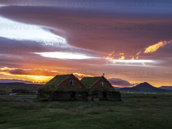 Sunset at Mödrudalur farm and guesthouse, church, dramatic cloud formation, northwest of