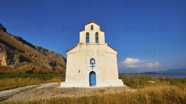 Agiou Petrou Chapel, Chapel of St Peter, Lonely church under a bright blue sky, surrounded by dry