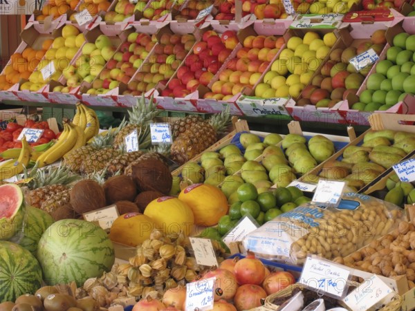 Market stall with different types of fruit and vegetables