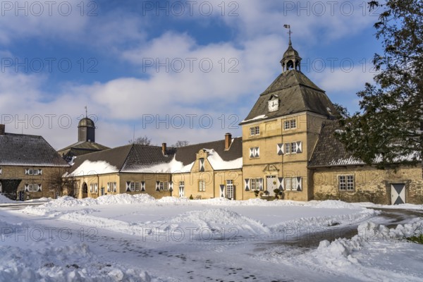 The snow-covered Westerwinkel Castle in winter, Herbern, Ascheberg, Münsterland, North