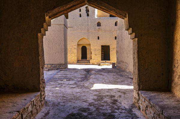 Narrow passageway in the largest preserved mud town in Oman, Al Bilaad, Al Bilaad Historical