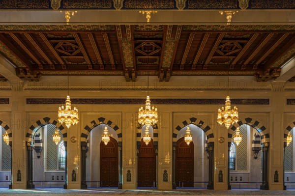 Side entrances with illuminated chandeliers of the Sultan Qaboos Mosque, Muscat, Arabian Peninsula,