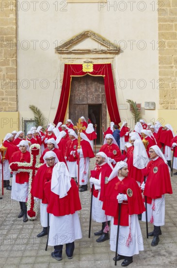 Confraternity of penitents gathering outside San Leonardo church, Enna, Siclly, Italy, Europe