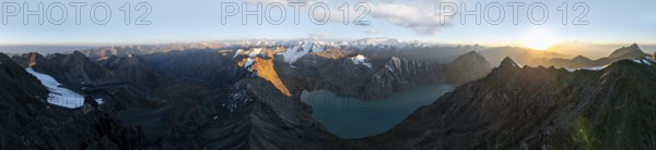 Evening mood, mountain panorama, aerial view, 4000 metre peak with glacier, mountain pass and