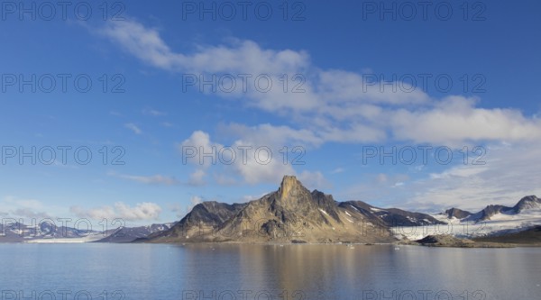 Mountain with steep sea cliffs in Hornsund fjord in summer, Svalbard, Spitsbergen, Norway, Europe