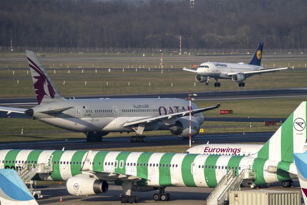 Düsseldorf Airport, Qatar Airways Boeing 787 Dreamliner, Eurowings aircraft on the apron, taxiway,