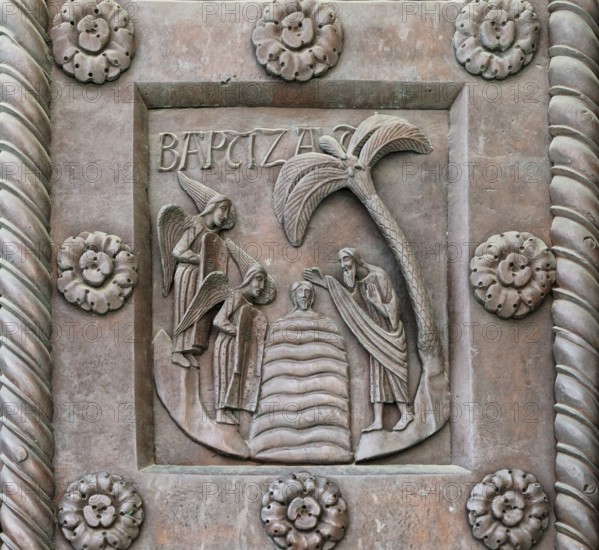 John the Baptist baptising Jesus in the Jordan, detail Porta di San Ranieri, sculptor Bonanus of