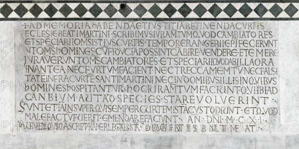 Medieval inscription for the money changers' guild, Romanesque, main façade, cathedral, Cattedrale