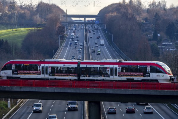 A3 motorway between Düsseldorf and Leverkusen, near Erkrath, railway bridge, Regio train