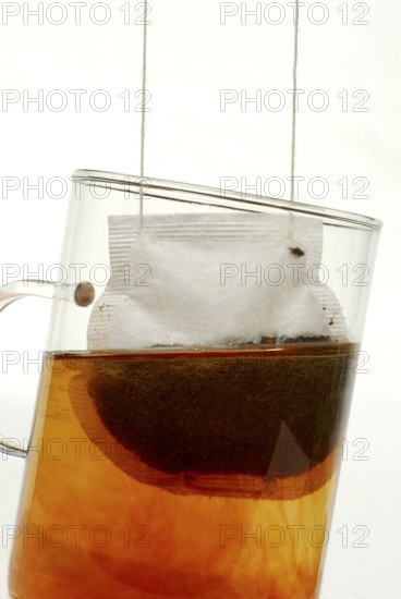 Cup of black tea, tea bag