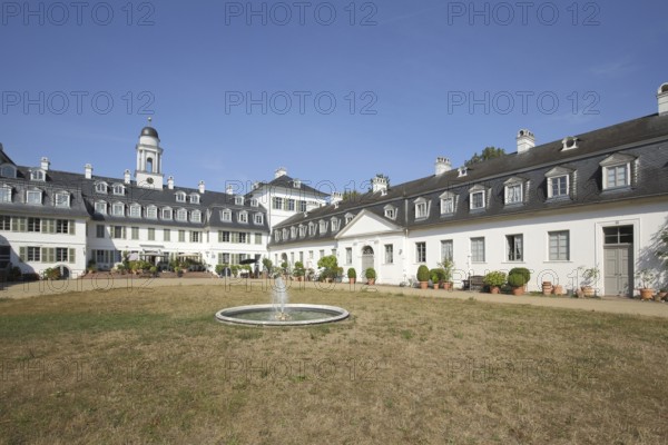 Inner courtyard with fountain of the baroque Rumpenheim Castle, white, Rumpenheim, Main, Offenbach,