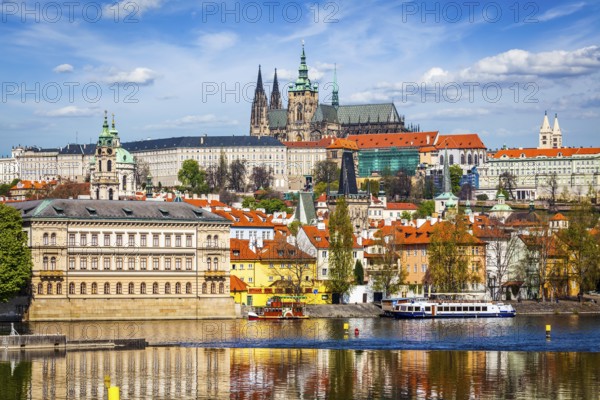 View of and Gradchany Prague Castle and St. Vitus Cathedral over Vltava river