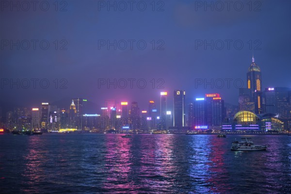 HONG KONG, CHINA, APRIL 28, 2018: Hong Kong skyline cityscape downtown skyscrapers over Victoria
