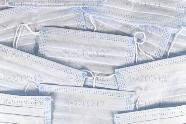 White protective disposable medical face masks background
