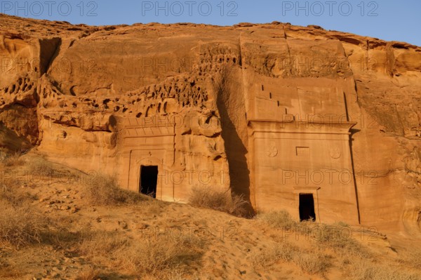 Nabataean tombs at Djabal Al-Ahmar in first daylight, Hegra or Madain Salih, AlUla region, Medina