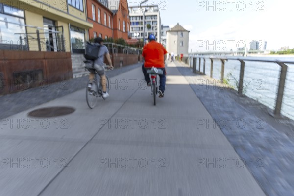Cycling from the first-person perspective on a shared footpath and cycle path in Cologne, North