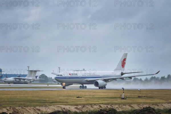 MINSK, BELARUS, JUNE 15, 2018: Air China flight Airbus A330-200 plane taking off on runway in