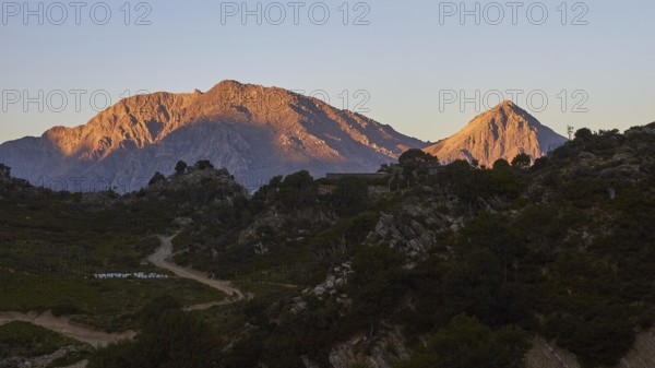 Kallergi Hut, Samaria Gorge, red morning light, cloudless blue sky, Omalos, Lefka Ori, White