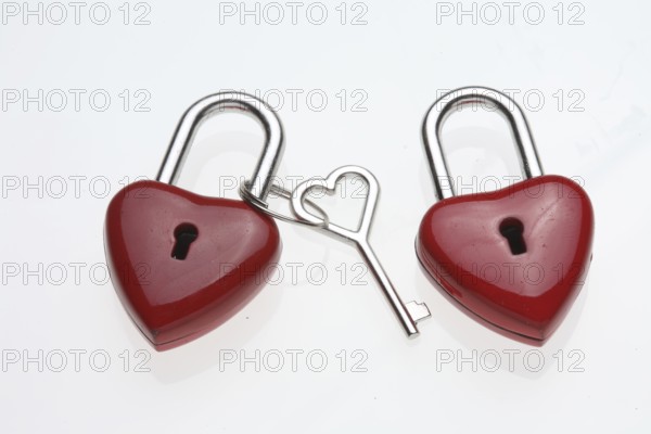 Small red padlocks with a heart-shaped key