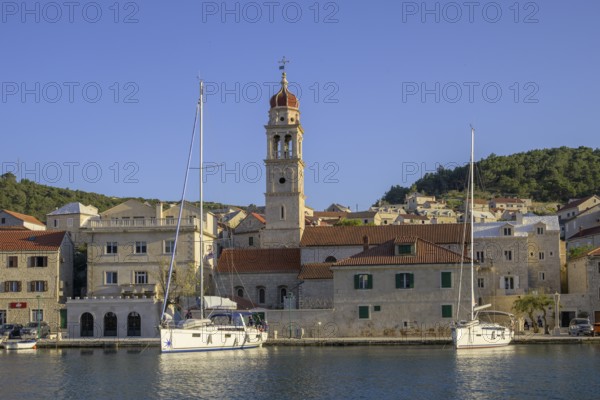 Church of St. Jerome of Stridon and sailing boats, Pucišca, Split-Dalmatia County, Croatia, Europe