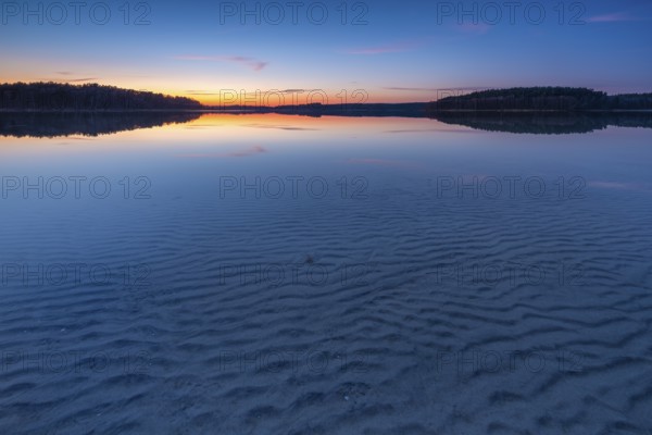 Lake Fürstensee, clear water with wave structure in the sand, sunset, Müritz National Park,
