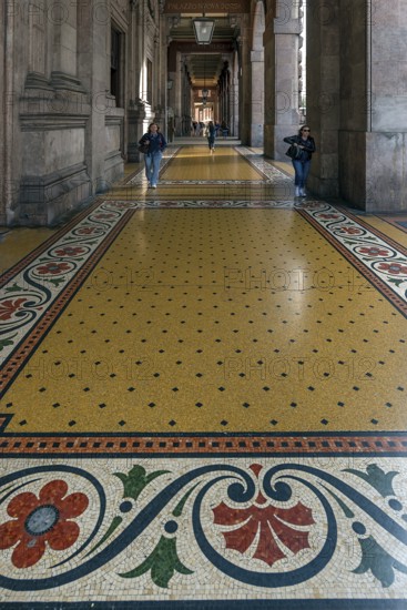 Floor mosaic in the arcade of the Palazzo della Borsa, built between 1907 and 1912, in Piazza de