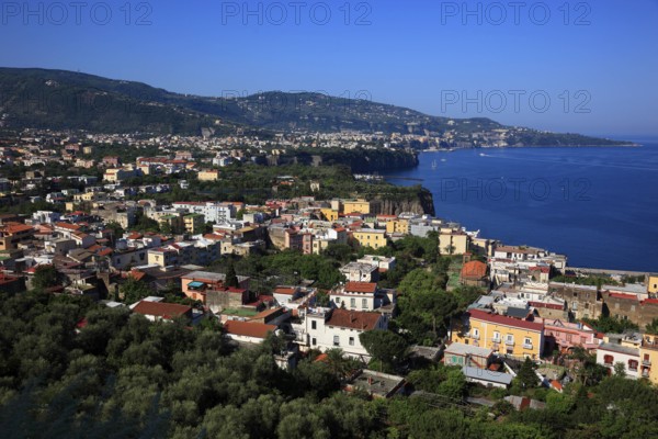View over the bay of Penisola Sorrentina with the towns of Meta (front) and Sorrento, Campania,