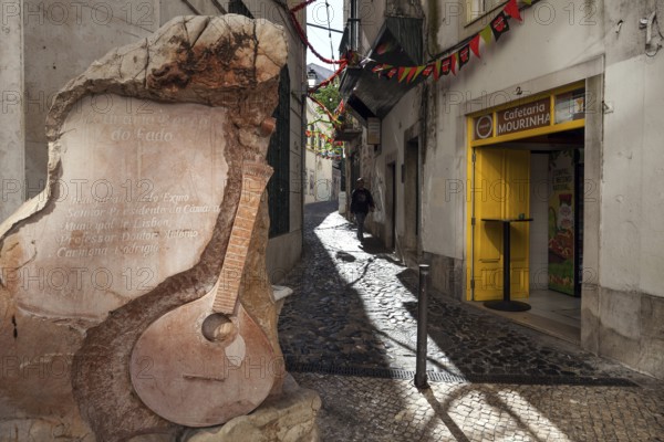 Rua Capelao, on the left a memorial stone for Fado music, Lisbon, Portugal, Europe