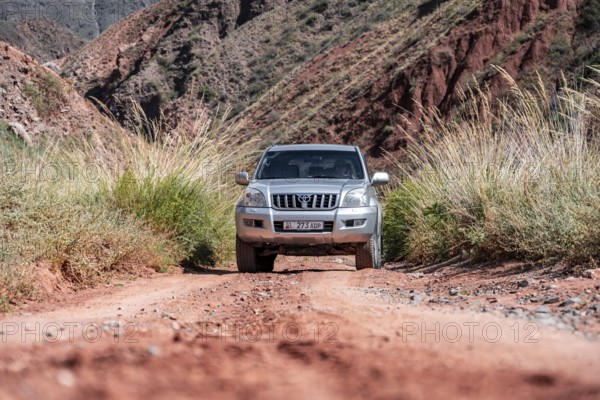 Toyota Landcruiser, off-road trip on unpaved road in a canyon, Chuy Province, Kyrgyzstan, Asia