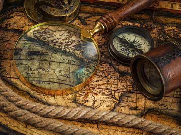 Travel geography navigation concept background, old vintage retro compass with sundial, spyglass