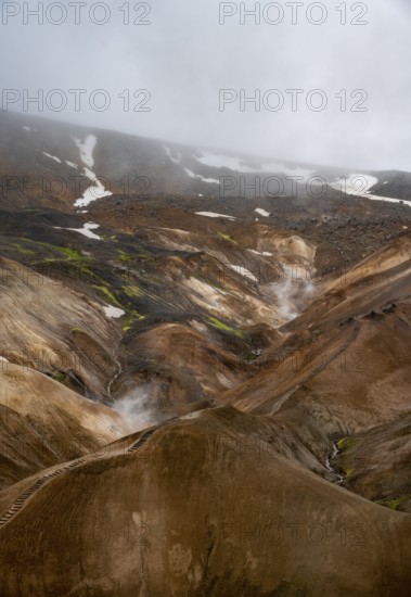 Steaming streams between colourful rhyolite mountains, Hveradalir geothermal area, Kerlingarfjöll,