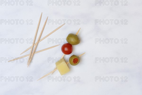 Stuffed olives on toothpicks, green olive