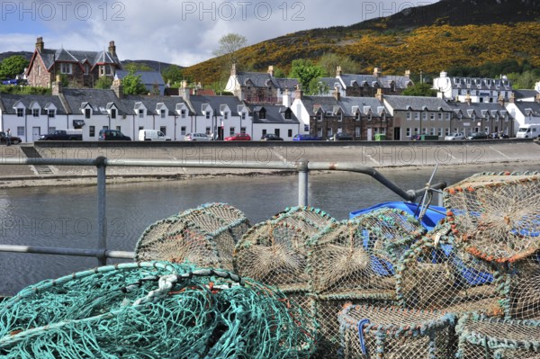 Stacked lobster traps, traps in Ullapool harbour, Highlands, Scotland, UK