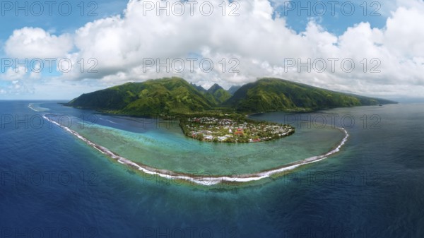 Aerial view, panorama, fringing reef in front, beach village Taurita behind, Tai'arapu-Est