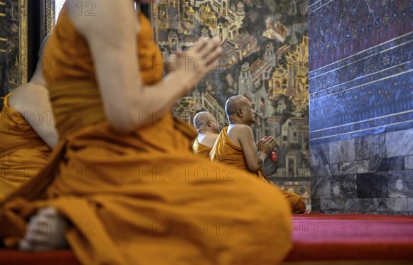 Buddhist monks at prayer, Wat Pho, Temple of the Reclining Buddha, Bangkok, Thailand, Asia