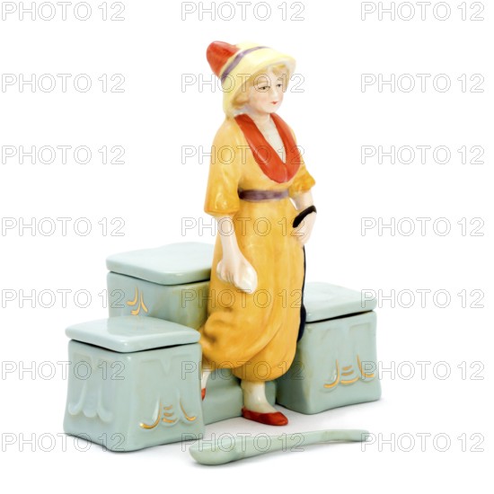 Antique porcelain boxes for cosmetics with figurines. Isolated picture