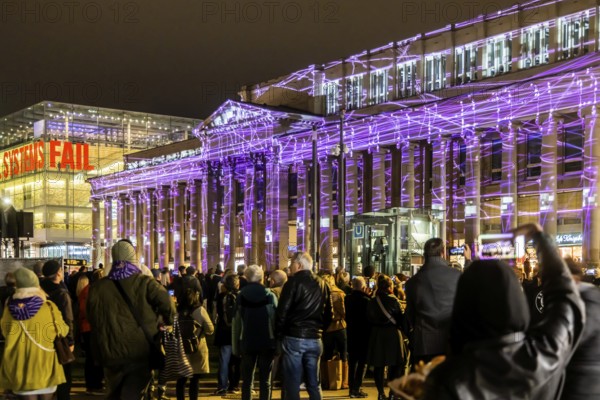 Stuttgart lights up. Long shopping night in the city centre with a light show. The Königsbau is