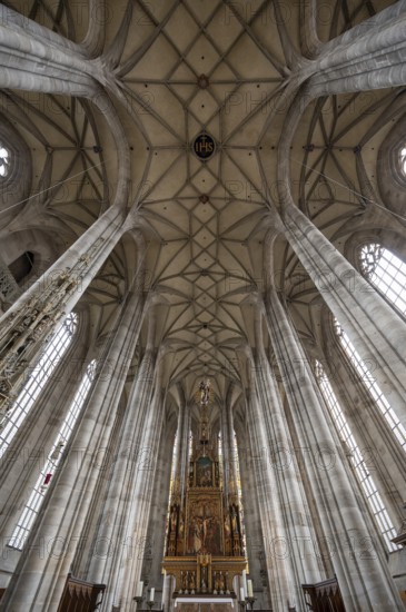 Interior with net vault and high altar in the late Gothic hall church of St George, Dinkelsbühl,