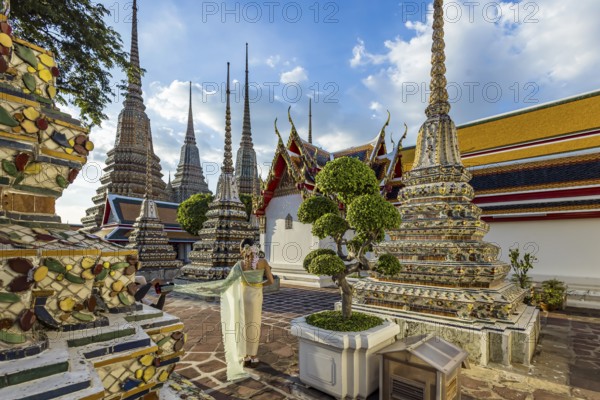 Wat Pho Temple is Bangkok's oldest Buddhist monastery near the Grand Palace. Four chedis are among
