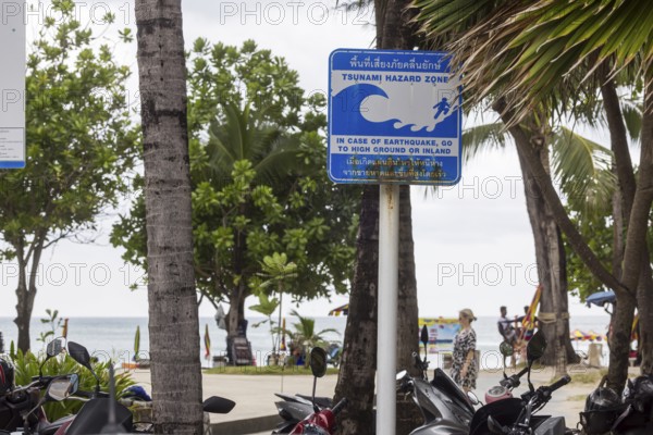 Tsunami Hazard Zone. Warning sign, signposting of escape routes in the event of another seaquake.