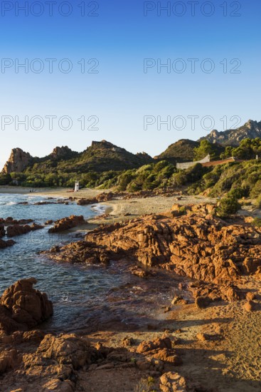 Lonely picturesque beach and red rocks, Spiaggia Su Sirboni, sunrise, near Tertenia, Province of