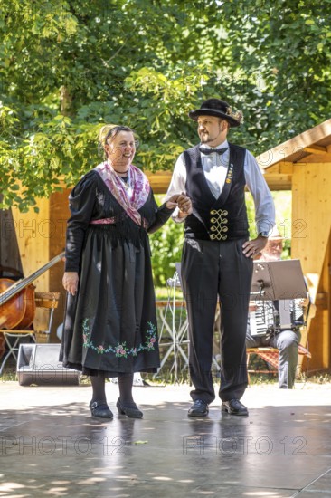 Couple of a folk dance group in traditional Black Forest traditional costume, Black Forest Open Air